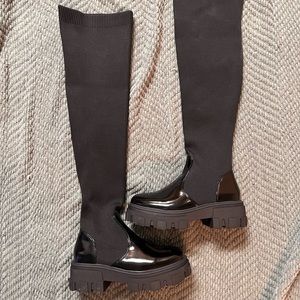 Thigh high black boots